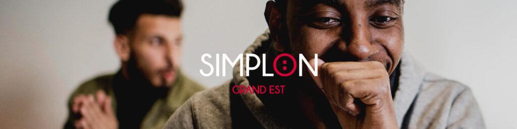 Photo de deux apprenants de chez Simplon avec le logo Simplon Grand-Est
